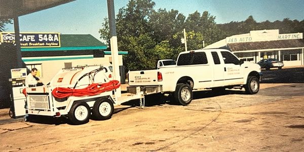 Cale Harris Drywall, Inc. spray rig truck at the Lake of the Ozarks, 2000–2003